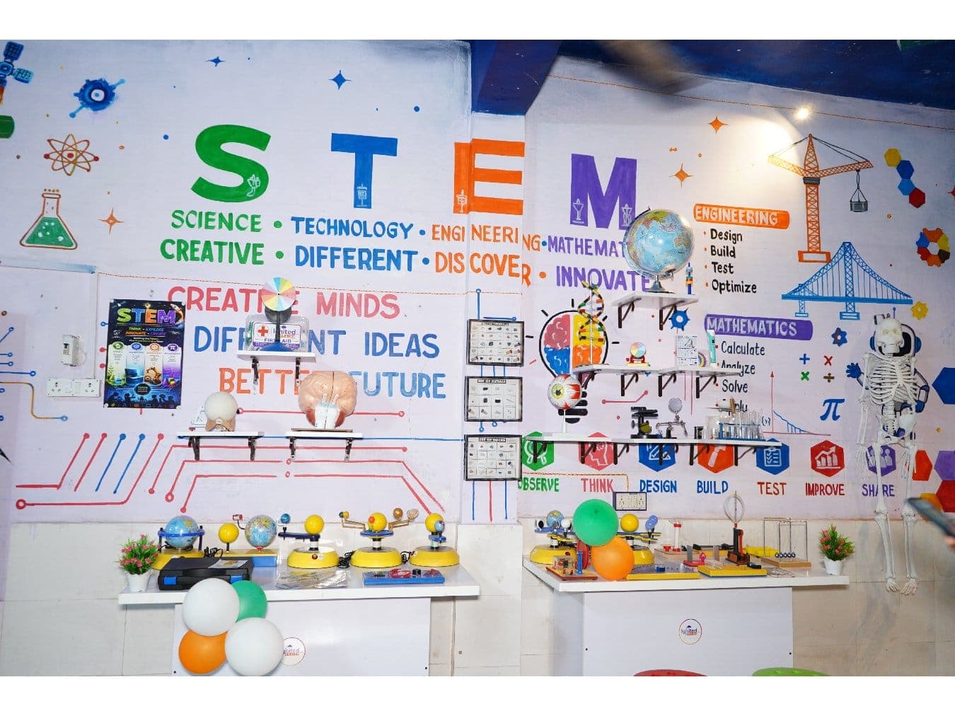 Students building an engineering structure in a STEM lab